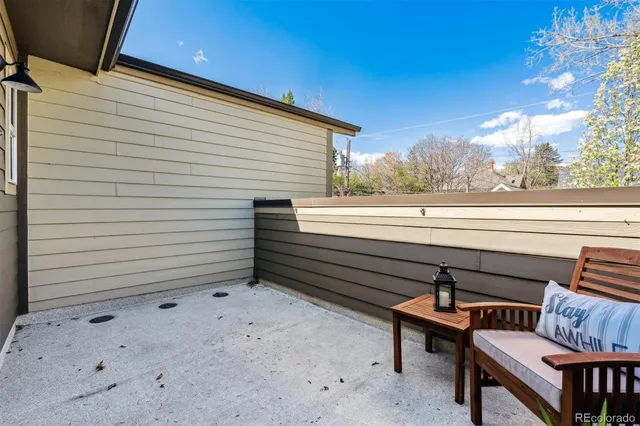 a view of a terrace with outdoor seating