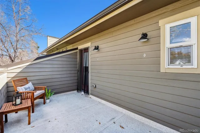 a view of an empty room with furniture and cabinet
