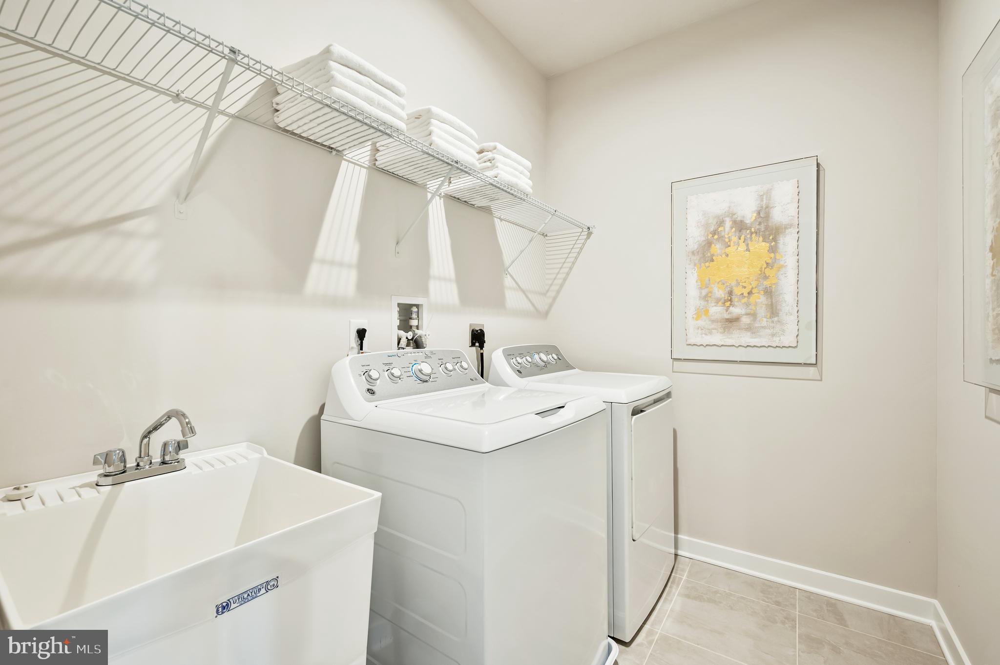 8440 Branch Side Way, Unit D Brandywine, MD 20613 - Photo 16 of 21 LAUNDRY ROOM W/OPT. WASHER/
DRYER & LAUNDRY TUB