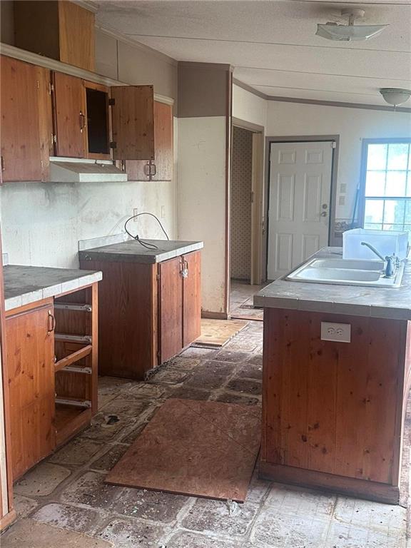 749 Chambers Road Commerce, GA 30530 - Photo 7 of 13 a kitchen with stainless steel appliances granite countertop a sink stove and cabinets
