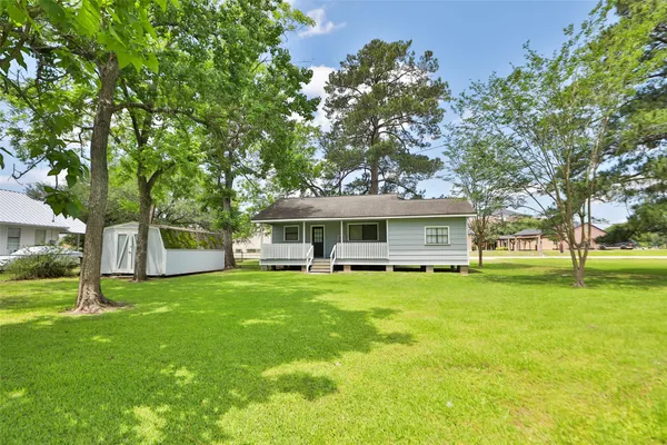 front view of a house with a yard
