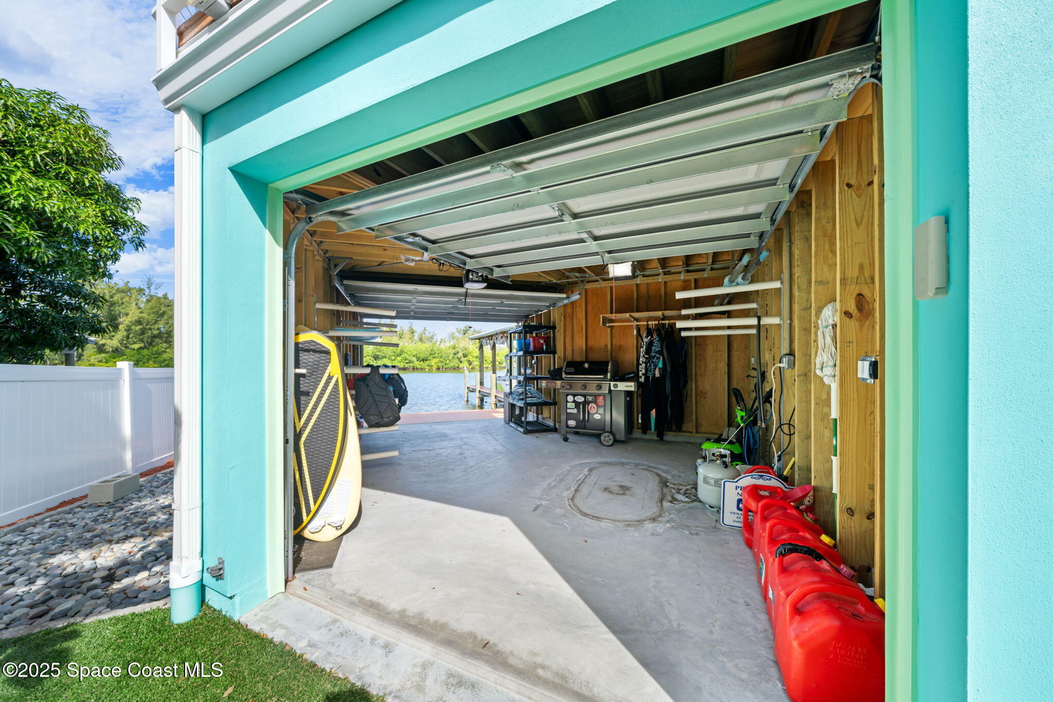 1214 Samar Road Cocoa Beach, FL 32931 - Photo 54 of 83 Custom Garage to Store Water Toys!