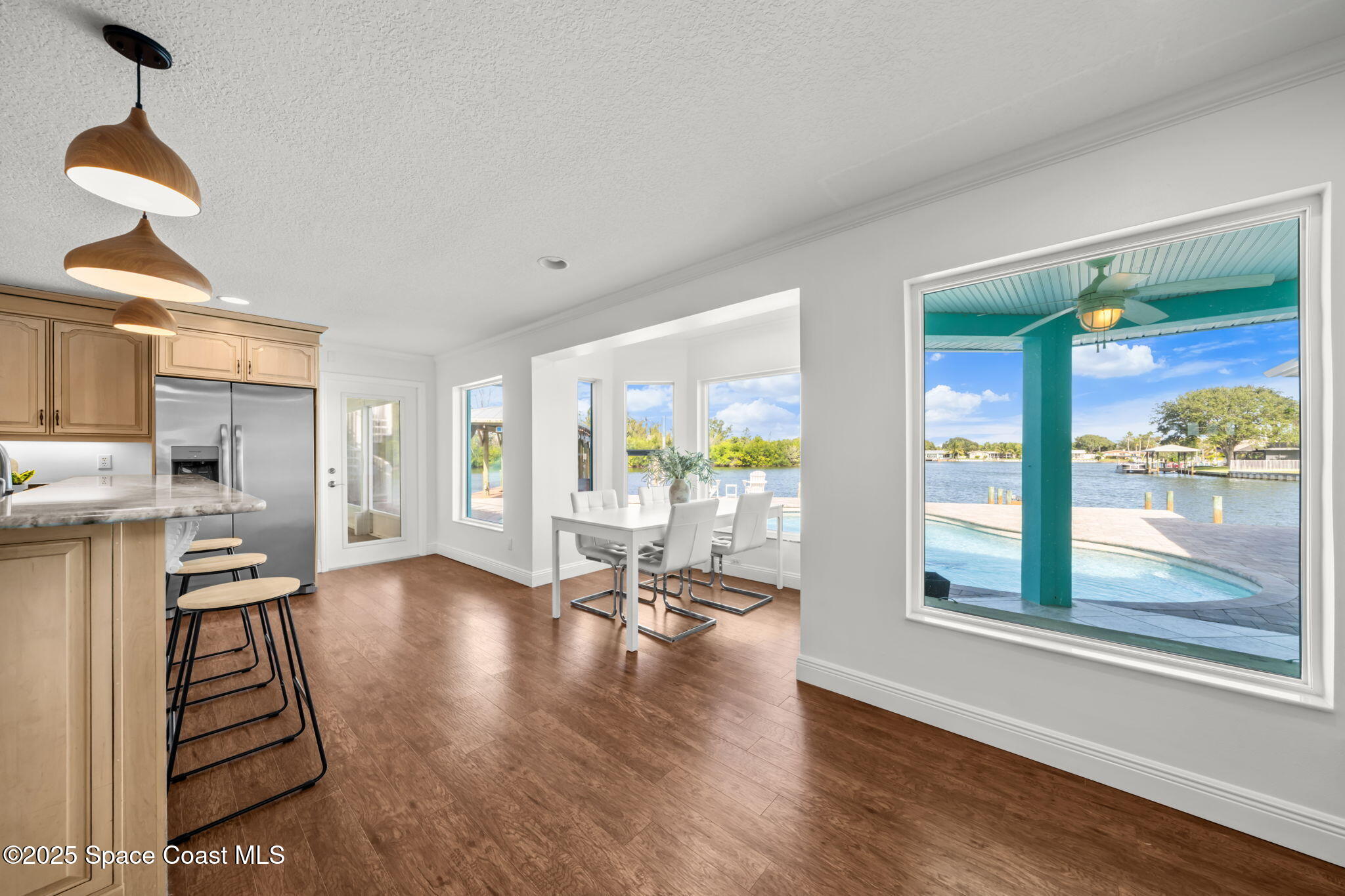 1214 Samar Road Cocoa Beach, FL 32931 - Photo 8 of 83 Downstairs to the Kitchen & VIEWS!