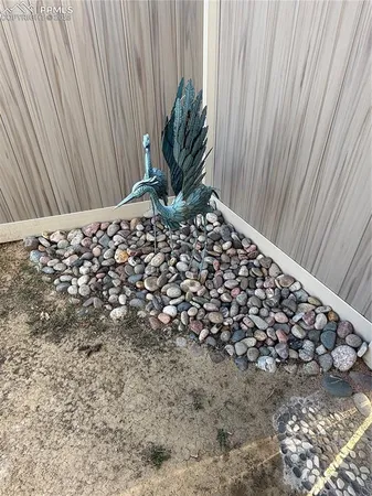 a view of a backyard with pathway