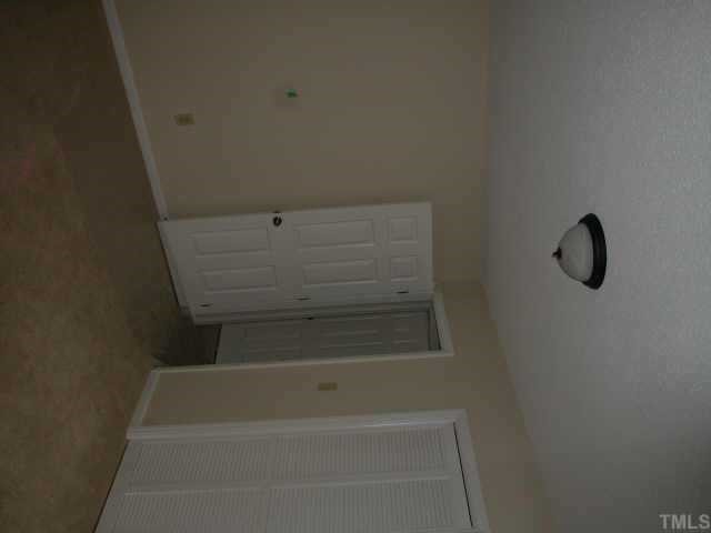 7201 Stuart Drive Raleigh, NC 27615 - Photo 5 of 9 a bathroom with a bathtub