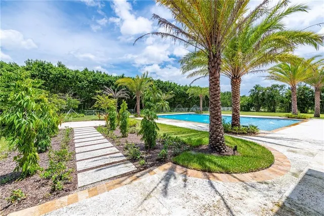 a view of a backyard of a house