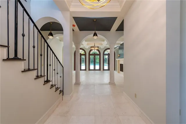 a view of a entryway door with wooden floor