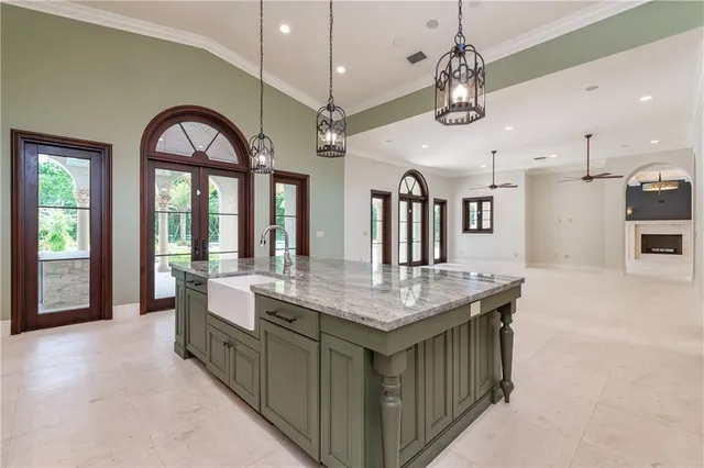 a utility room with sink dryer and washer