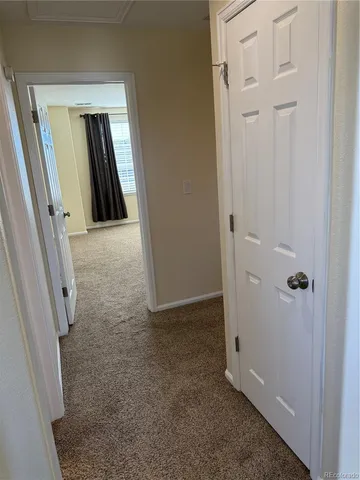a bathroom with a granite countertop toilet a sink and a shower