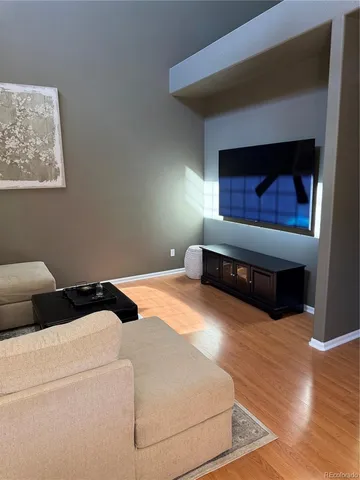 a bedroom with a bed and a fireplace