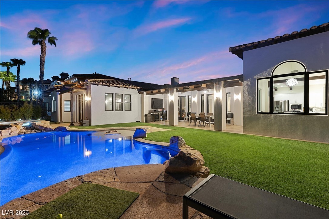 3 Rue Allard Way Henderson, NV 89011 - Photo 1 of 49 Outdoor pool with a yard, a patio, and a jacuzzi