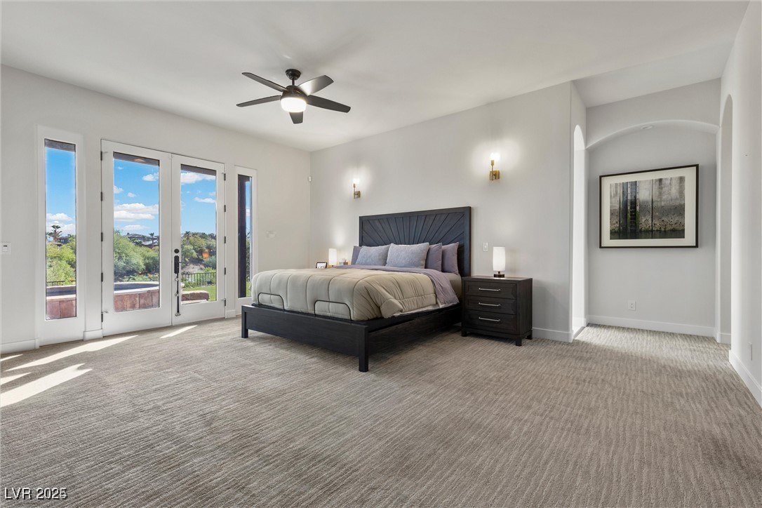 3 Rue Allard Way Henderson, NV 89011 - Photo 21 of 49 Bedroom with carpet floors, access to outside, baseboards, and ceiling fan