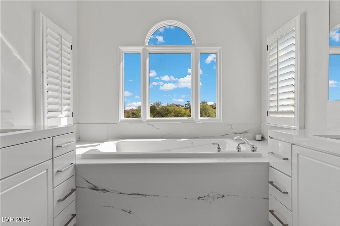 3 Rue Allard Way Henderson, NV 89011 - Photo 24 of 49 Bathroom featuring a garden tub and vanity