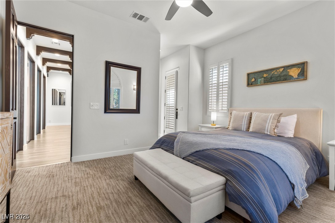 3 Rue Allard Way Henderson, NV 89011 - Photo 25 of 49 Carpeted bedroom with visible vents, ceiling fan, and baseboards