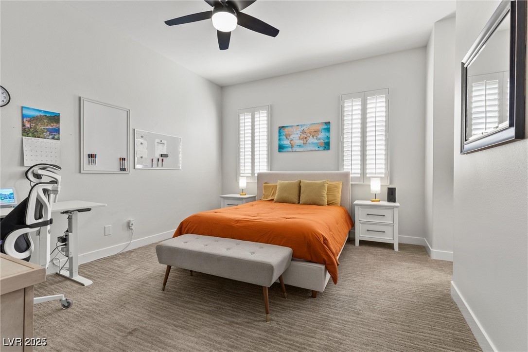 3 Rue Allard Way Henderson, NV 89011 - Photo 29 of 49 Carpeted bedroom featuring a ceiling fan and baseboards