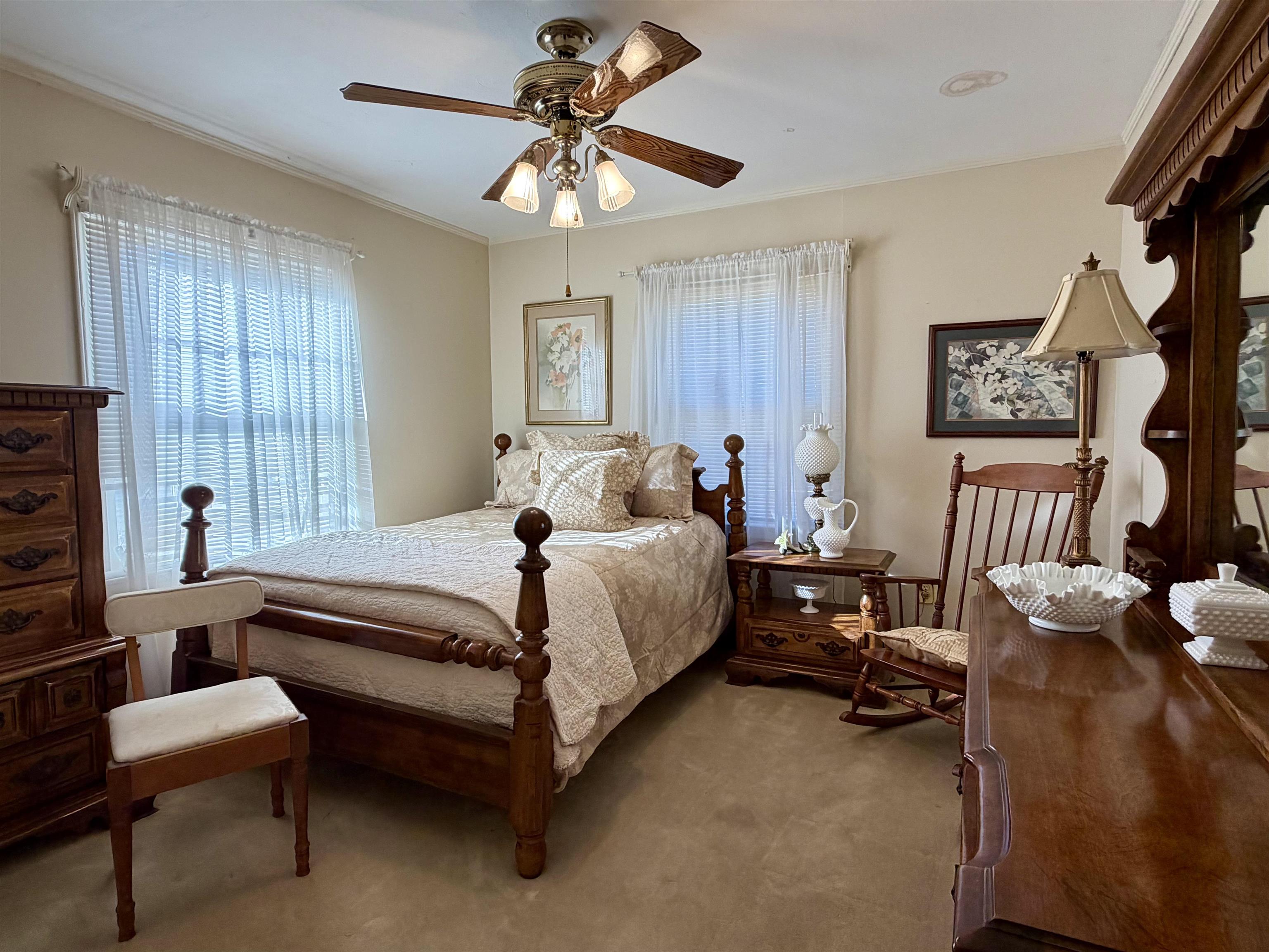 192 New Bethel Road Selmer, TN 38375 - Photo 19 of 27 Carpeted bedroom featuring ceiling fan