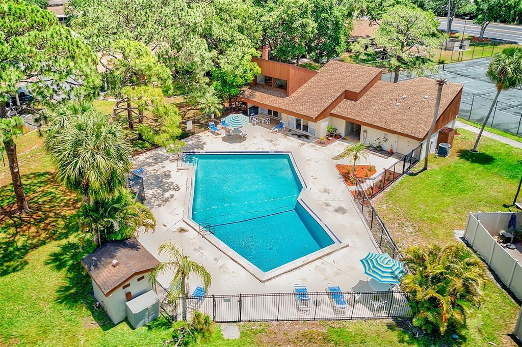 2064 Sunset Point Road, Unit 73 Clearwater, FL 33765 - Photo 2 of 58 an aerial view of a house with garden space and street view