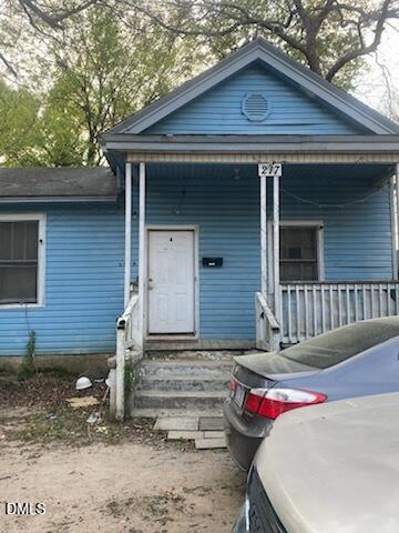 217 Heck Street Raleigh, NC 27601 - Photo 11 of 22 a front view of a house with stairs