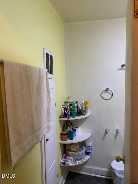 217 Heck Street Raleigh, NC 27601 - Photo 4 of 22 a room with a table and a potted plant