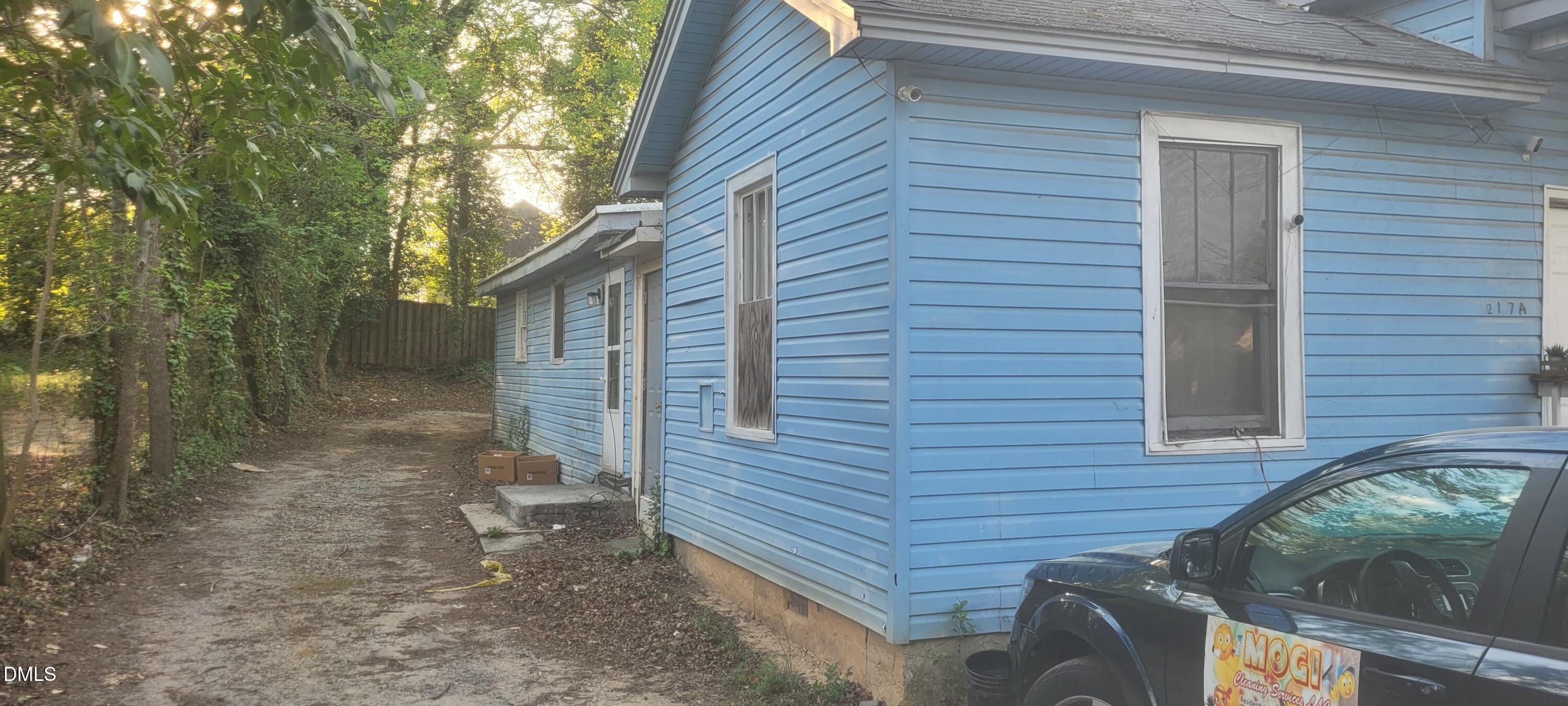 217 Heck Street Raleigh, NC 27601 - Photo 8 of 22 a view of a backyard with sitting area