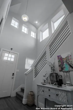 a view of entryway with livingroom and kitchen