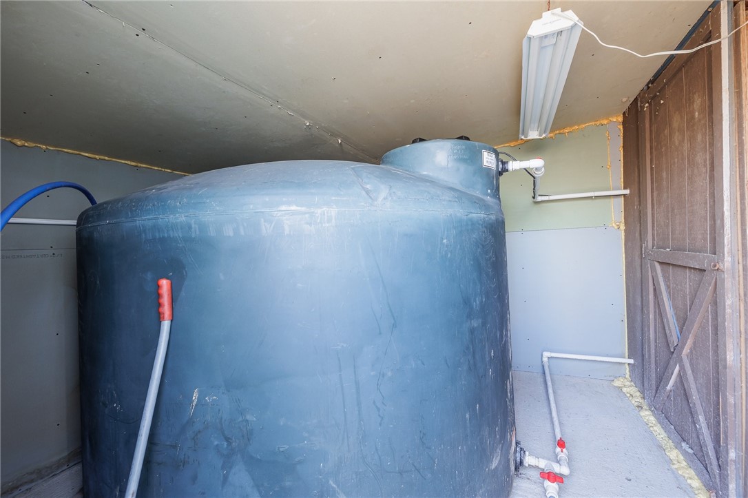 9470 Schmidt Road West Sparta, NY 14437 - Photo 13 of 43 Additional water tank in rec hall.