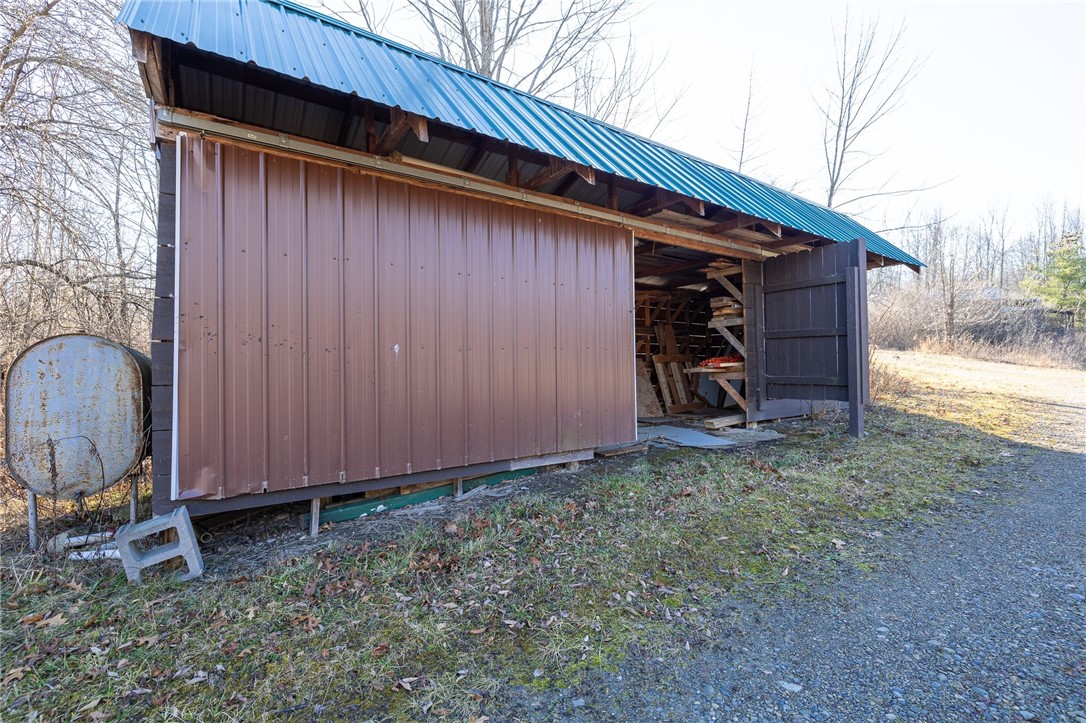 9470 Schmidt Road West Sparta, NY 14437 - Photo 17 of 43 One of the pole barns for additional storage.