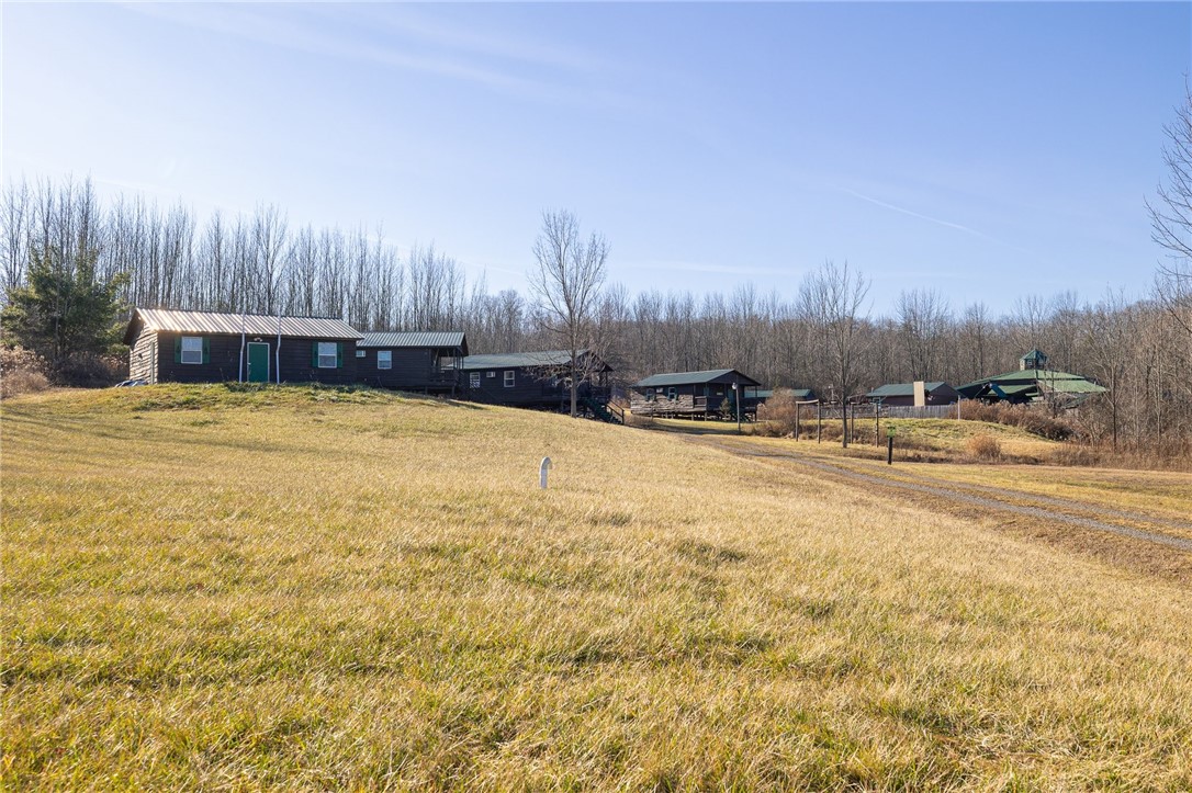 9470 Schmidt Road West Sparta, NY 14437 - Photo 27 of 43 View of bath house, 2 bunk houses, and rec hall.