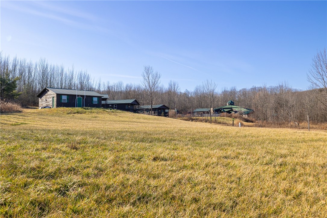 9470 Schmidt Road West Sparta, NY 14437 - Photo 38 of 43 Bath house, two bunk houses and rec hall in the di