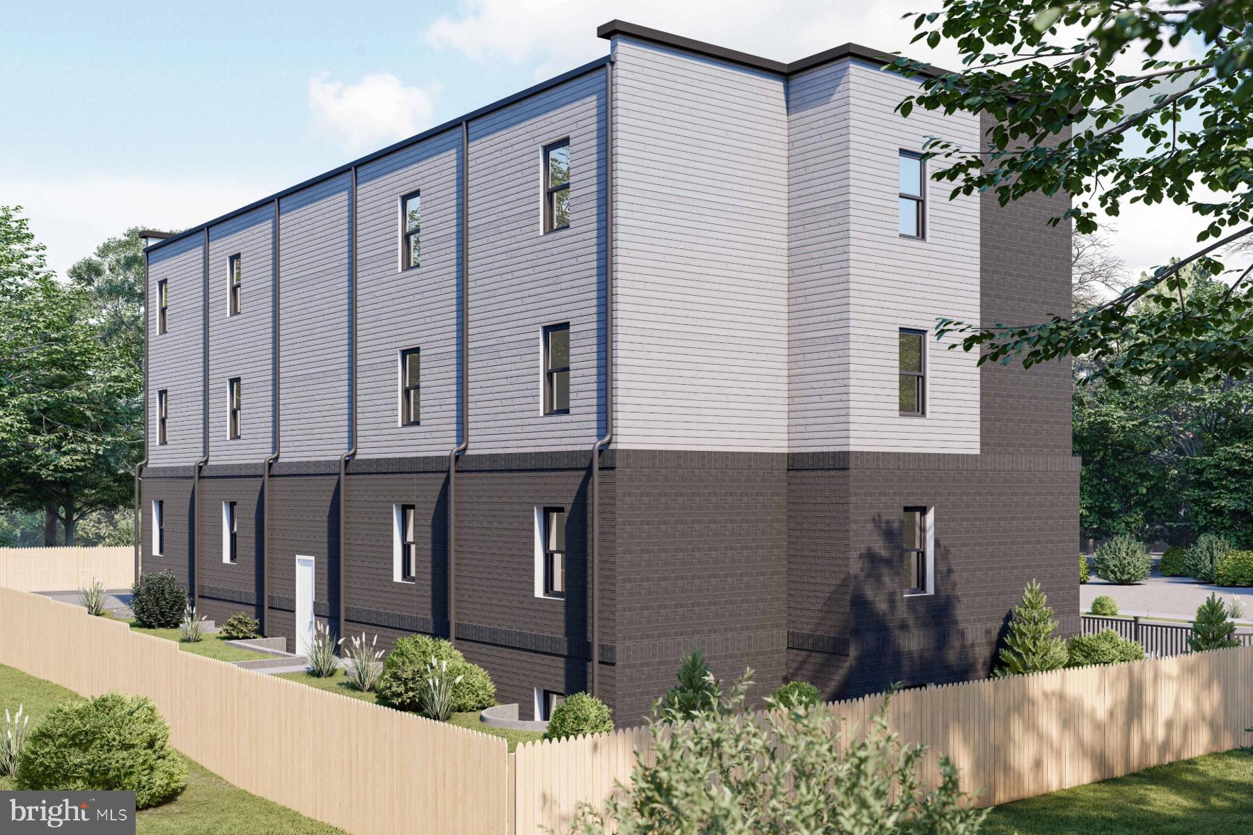 2611 12th Place Southeast Washington, DC 20020 - Photo 2 of 5 a front view of a house with a yard