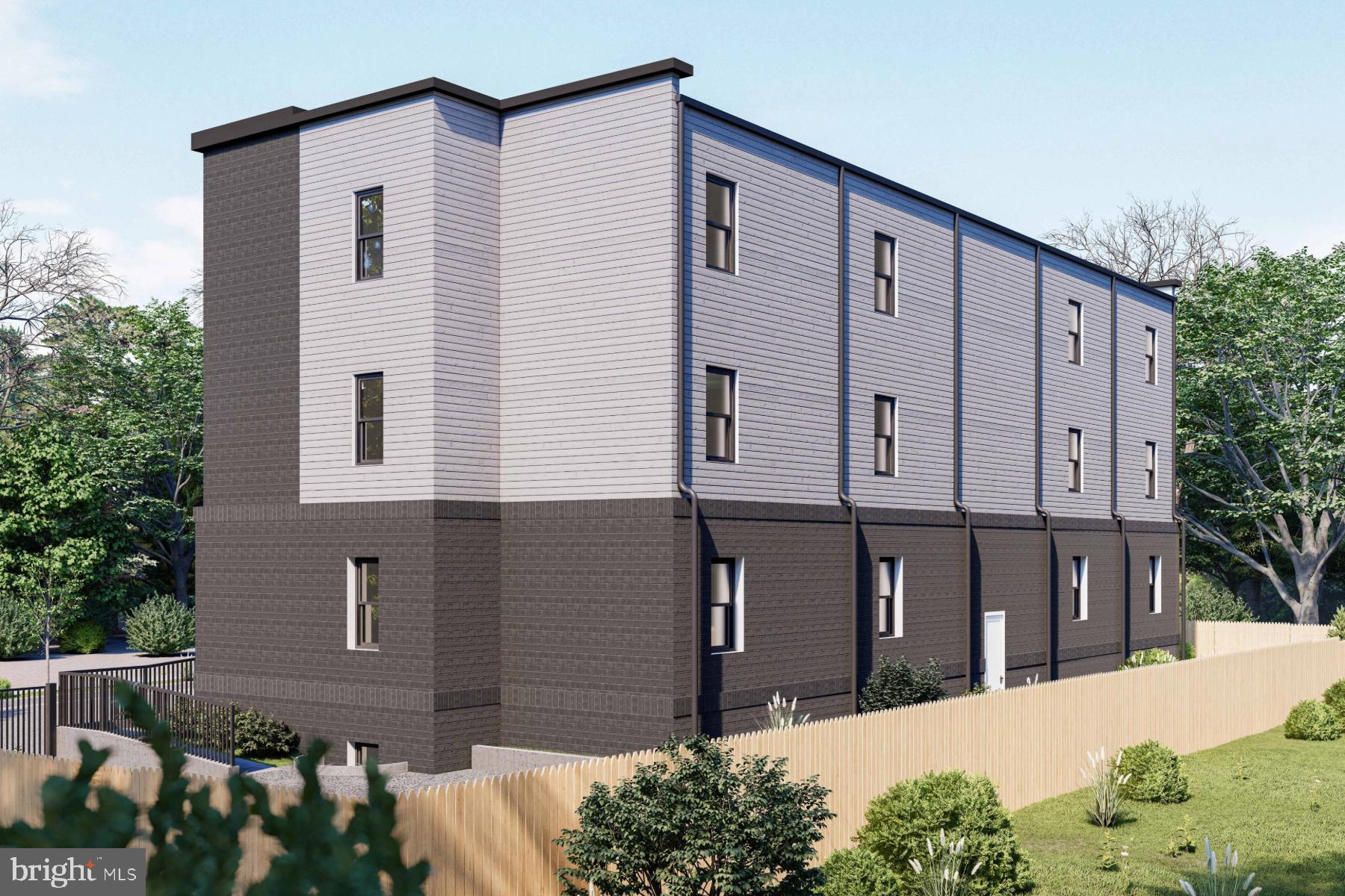 2611 12th Place Southeast Washington, DC 20020 - Photo 3 of 5 a front view of a house with a yard