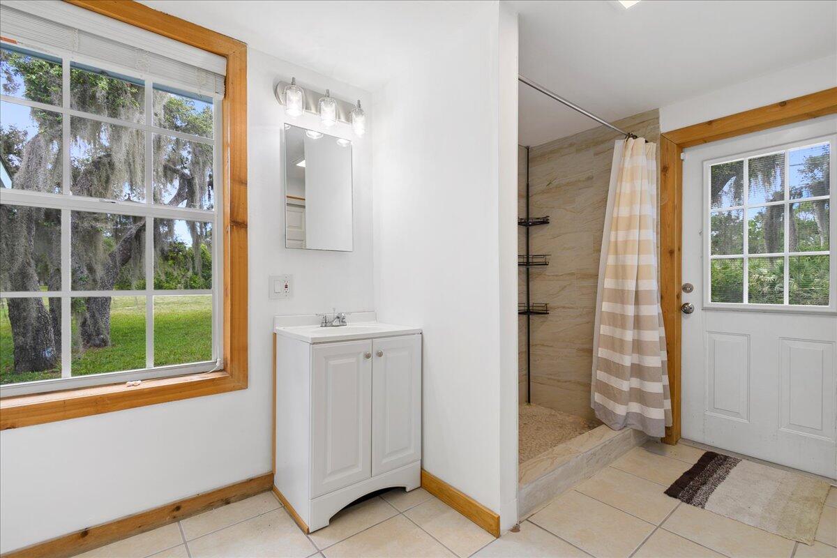 8951 Southwest Fox Brown Road Indiantown, FL 34956 - Photo 20 of 34 Primary Bathroom