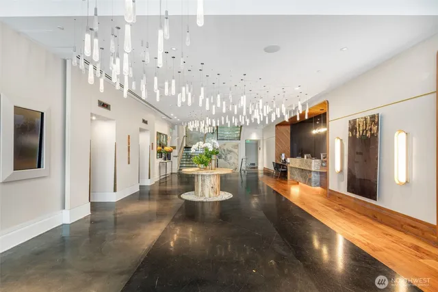a view of a living room and chandelier