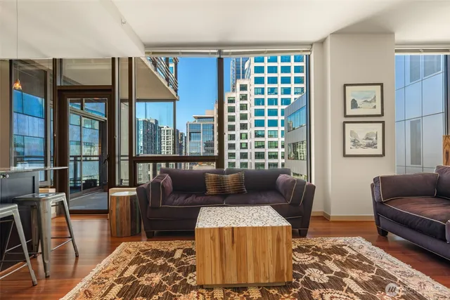 a living room with furniture and a window