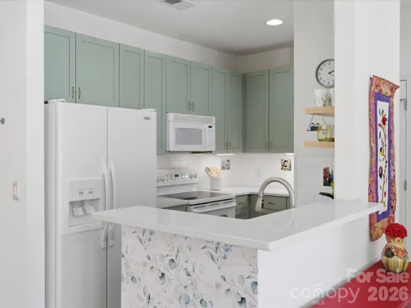 a bathroom with a sink a faucet a refrigerator and a sink