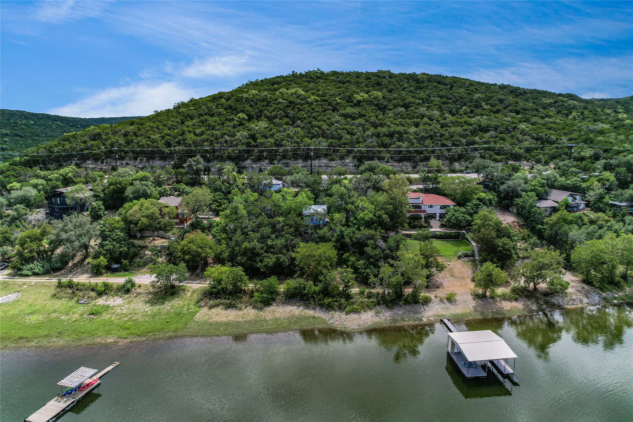 13527 Bullick Hollow Road Austin, TX 78726 - Photo 7 of 11 a view of a lake with outdoor space