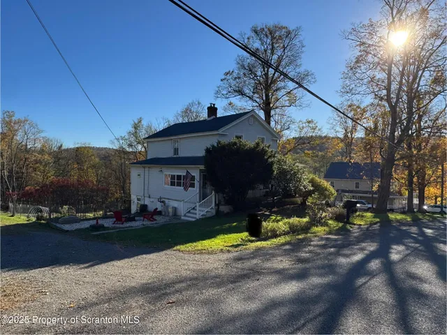 a black and white photo of a living room
