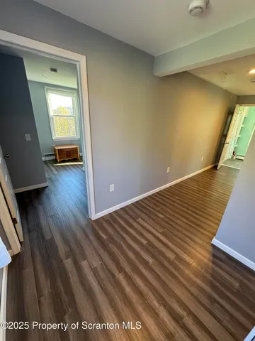 a view of a field with trees