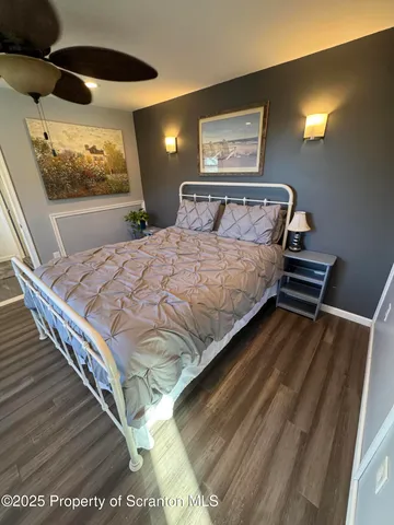 a kitchen with stainless steel appliances a stove a sink and a microwave