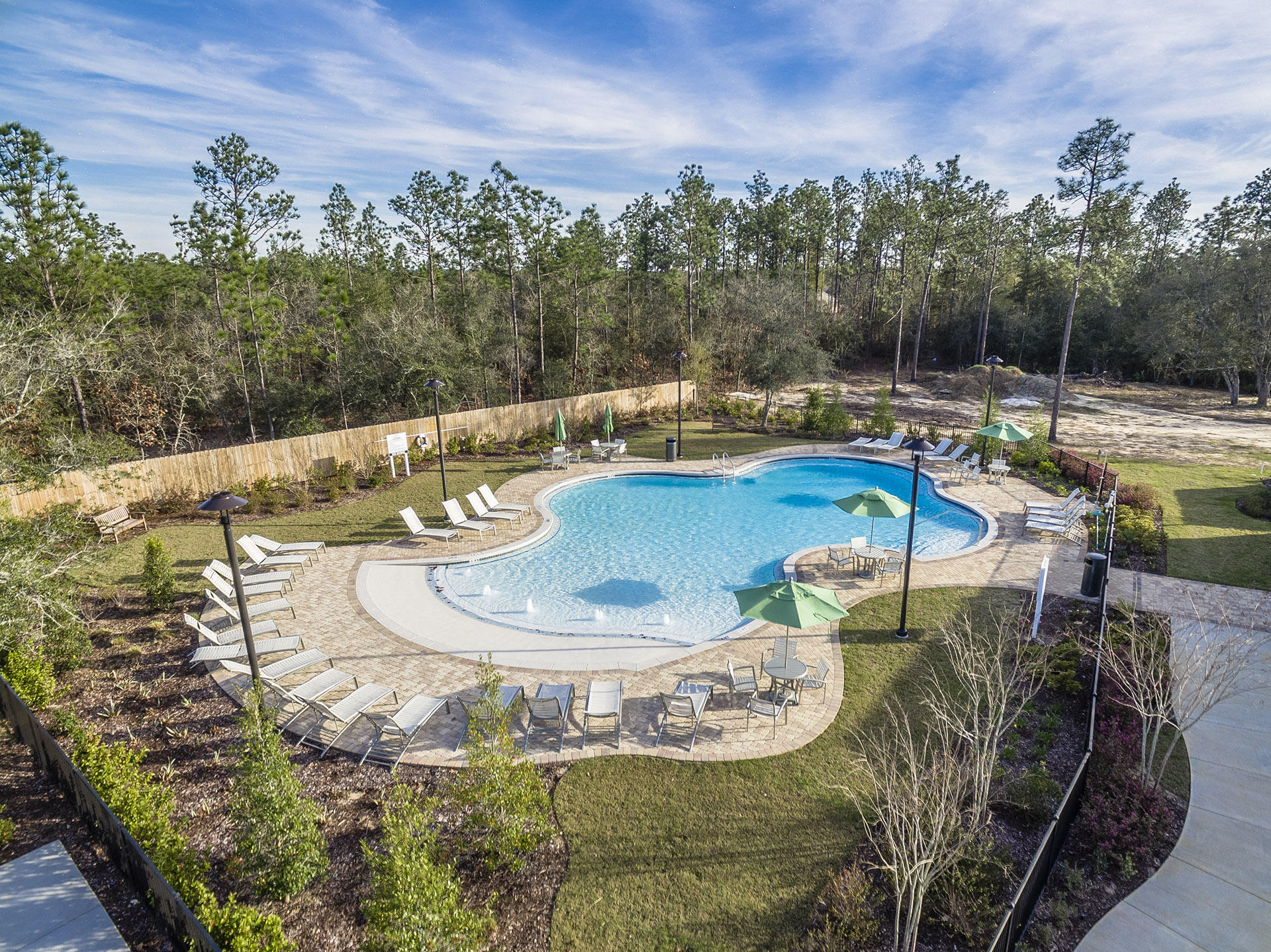 955 Merganser Way Crestview, FL 32539 - Photo 2 of 8 a view of a swimming pool with a yard