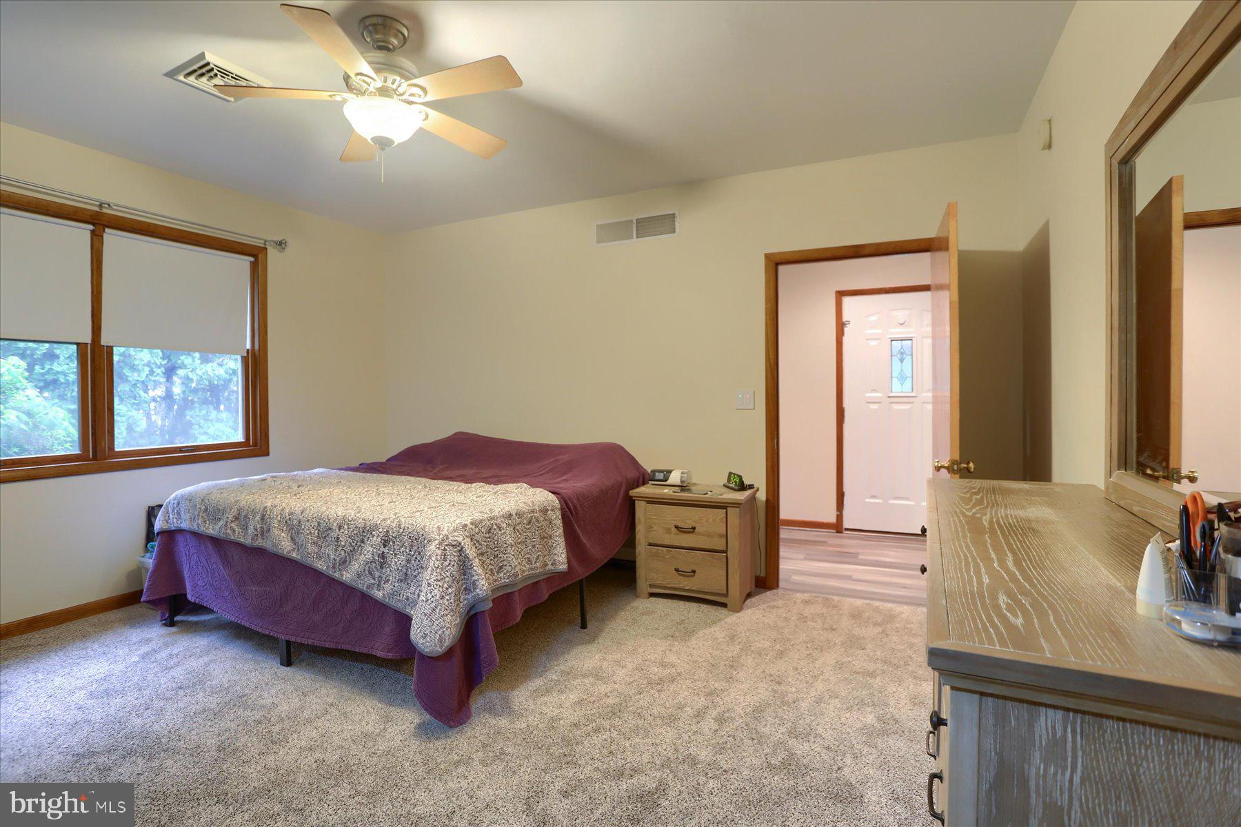 12 South Ridge Road Boiling Springs, PA 17007 - Photo 17 of 39 a spacious bedroom with a bed and window