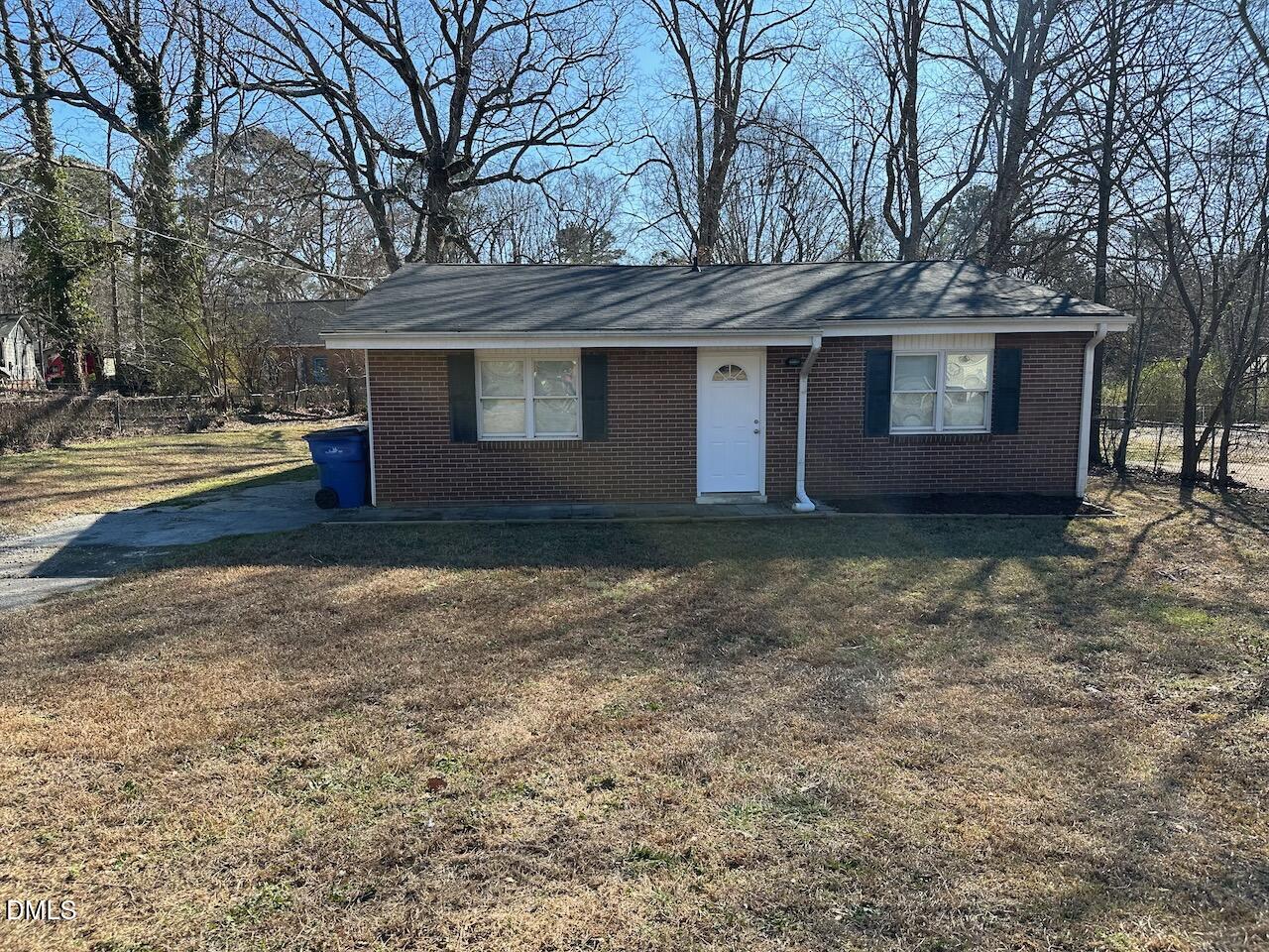 1128 Savannah Drive Raleigh, NC 27610 - Photo 1 of 21 a house that has a tree in front of it