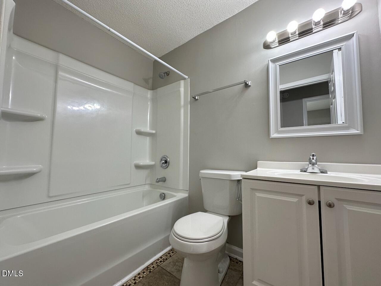 1128 Savannah Drive Raleigh, NC 27610 - Photo 17 of 21 a bathroom with a sink toilet and shower