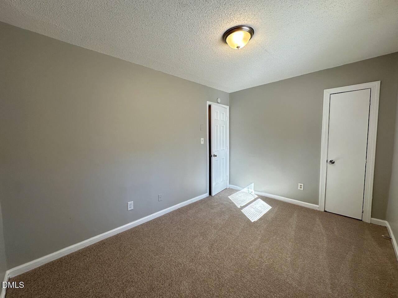 1128 Savannah Drive Raleigh, NC 27610 - Photo 18 of 21 a view of an empty room