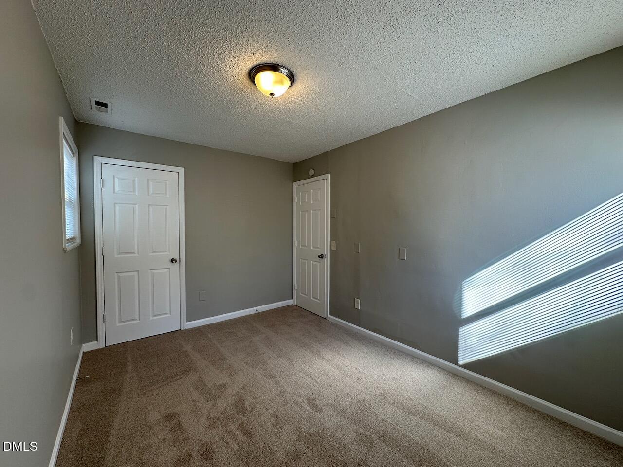 1128 Savannah Drive Raleigh, NC 27610 - Photo 19 of 21 a view of an empty room
