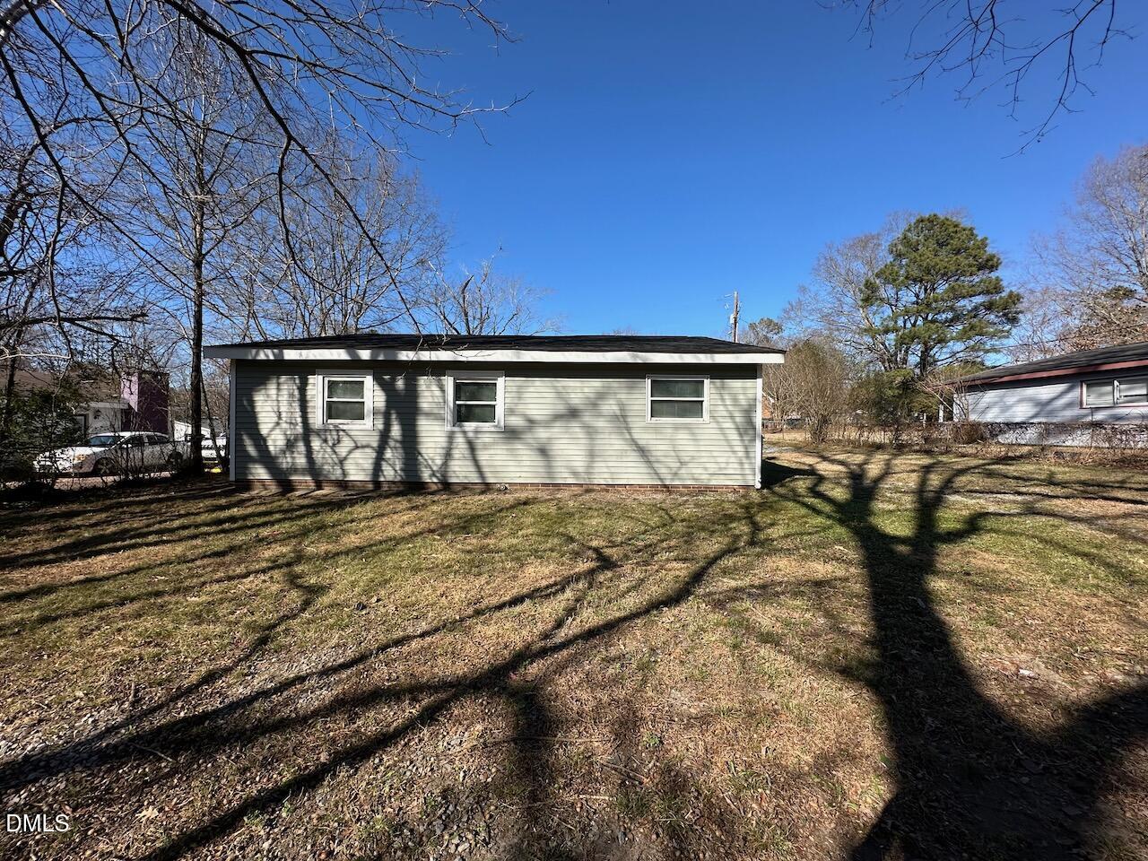 1128 Savannah Drive Raleigh, NC 27610 - Photo 20 of 21 a view of a house with a yard