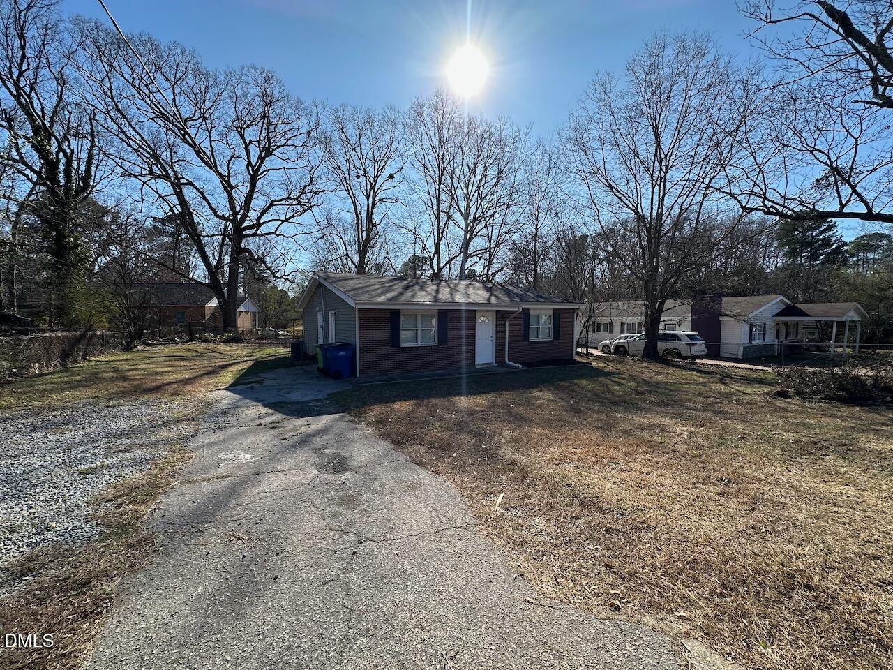 1128 Savannah Drive Raleigh, NC 27610 - Photo 3 of 21 a view of a house with a yard covered in snow