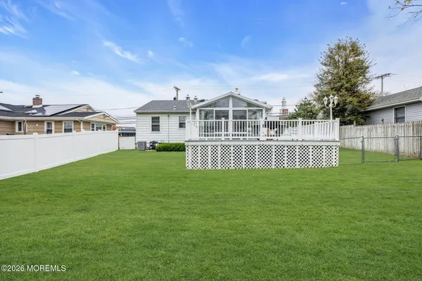 a view of a house with a big yard
