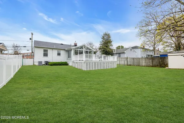 a view of a house with a back yard
