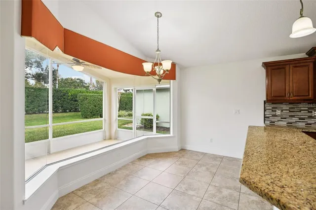 a view of a room with a large windows